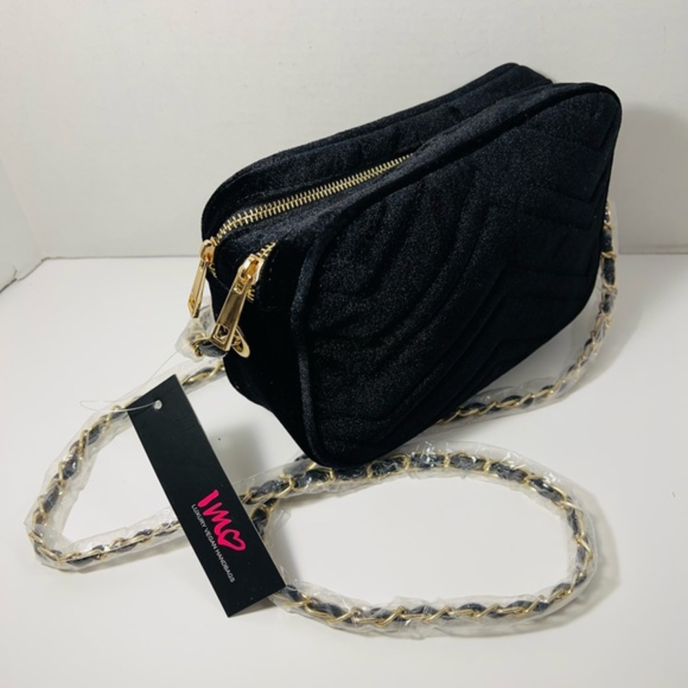 Black Quilted Shoulder Bag.